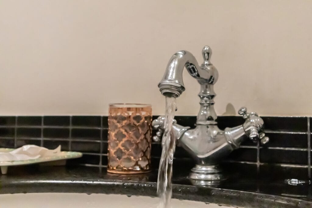 Water running through a vintage faucet